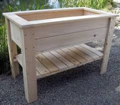 The planter boxes have been shaped up and then screwed together to the ladder structure to form up this awesome planter that would add oodles of charm and style to your patio area. Elevated Planters Vegetable Garden Raised Beds Raised Garden Diy Raised Garden