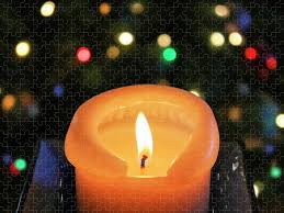 Learn the basics of candle making and then get creative with these crafty ideas for handmade candles. A Candle In Front Of A Christmas Tree Puzzle For Sale By Derrick Neill
