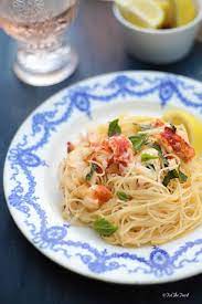 Lobster And Mascarpone Lemon Sauce Served Over Angel Hair Pasta Recipe Lobster Recipes Lobster Dishes Lemon Sauce