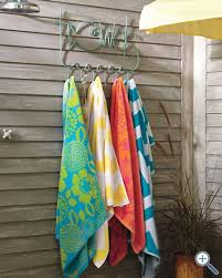 They make excellent play mats for your babies, festival when you take your beach towel traveling with you, not only does it meet all of the above needs, it also has to fold up small enough for you to stow away in. Outdoor Beach Towel Hooks Off 74