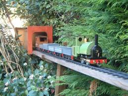 Wooden logs are great material for creating your own wooden train planter. Garden Railroads