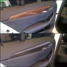 Mr Tint Wrapped All The Stock Woodgrain Paneling On The Door Panels And The Dash Of This Bmw X1 In 3m Carbon Car Wrap Vinyl Wrap Carbon Fiber