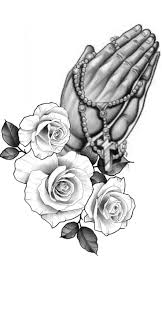 Adorned with roses and names of beloved people who passed away, this memorial praying hands tattoo is touching. Pin On Flower Power