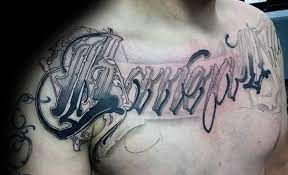 This tattoo includes the first letter of the name inked in black. 50 Last Name Tattoos For Men Honorable Ink Ideas