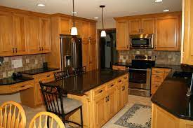 Honey oak kitchen cabinets with black countertops |. Kitchen Remodel Idea With Honey Oak Cabinets Using Black Granite Countertops And Stainless Appliances Maple Kitchen Cabinets Oak Kitchen Honey Oak Cabinets