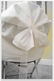 Chair covers for wedding ceremony with navy blue sashes. Pin On Wedding