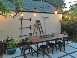 I Created This Outdoor Wall Art Using Repurposed Farm Tools For Our Outdoor Dining Area We Built Th Backyard Dining Area Outdoor Remodel Backyard Entertaining