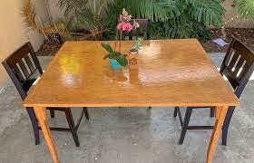Dining tables often are extendable in that the main table can be separated on a sliding mechanism, and from one to four additional matching table leaves can be inserted into the table to accommodate more diners. How To Refinish And Stain An Old Wood Table Learn To Create Beautiful Things