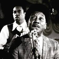 Muddy Waters with Sammy Lawhorn in the background! From Muddy's week long  residency at the Country Club, Hampstead, London in December 1970. Photo by  Gijsbert Hanekroot, courtesy Illinois Slim.