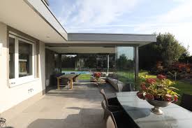 Anbau Terrasse Mit Schiebeturen Hochwertige Glasraume Von Sunflex Wintergarten Moderne Hausarchitektur Terassenideen