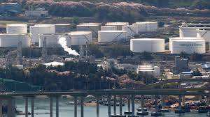 Oil little changed as investors assess mixed messaging on Iran peace talks