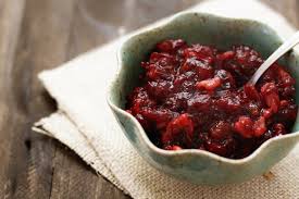 In a double boiler or metal bowl over simmering water, constantly whisk the egg yolks, water and lemon juice until mixture reaches 160° or is thick enough to coat the back of a spoon. Cranberry Orange Walnut Relish Make