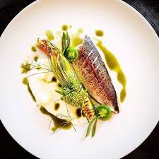 Torched Mackerel Zucchini Flower Filled With Smoked Mackerel Pesto Buttermilk With Fermented Cucumber Sea Fennel Green Toma Food Plating Food Amazing Food