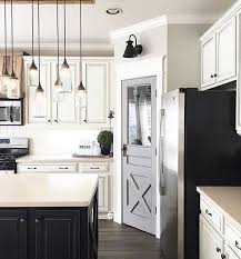 We Love This Farmhouse Style Pantry Door With Classic Cross Bracing Style Farmhouse Style Kitchen Modern Farmhouse Kitchens Farmhouse Kitchen Cabinets