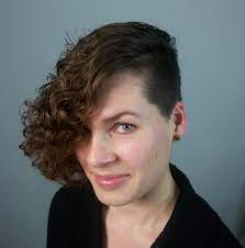 To get a curly comb over fade or side part, you can ask your barber for a fade on the sides and back, while leaving more length on top to comb to the side. Front View Curly Bob With Shaved Side Short Curly Hair Shaved Side Hairstyles Curly Hair Men