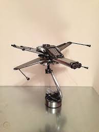 We created this website system because of our passion and not for profit. Star Wars X Wing Fighter Scrap Art Model Steel Sculpture 728787489