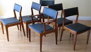 Scandinavian Woodworks Teak Dining Chairs In Black Vinyl Side Chairs And Arm Chairs Made In Singapore Teak Dining Chairs Dining Chairs Chair
