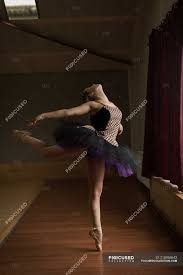 In classical ballet, the term arabesque indicates a position of the body where the dancer stands on one leg behind the body, with both knees straight. Graceful Ballerina Practice Arabesque Ballet Position In Studio Hobbies Culture Stock Photo 210956642