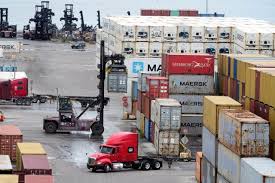 Dockworkers' union suspends strike until Jan. 15 to allow time to negotiate  new contract