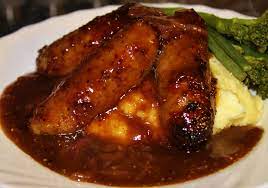 Click play to see this traditional bangers and mash with onion gravy recipe come together for a meat and potatoes dinner, this is an excellent recipe. Honey Mustard Sticky Sausages And Mash With Caramelised Red Onion Gravy Homemade With Mess