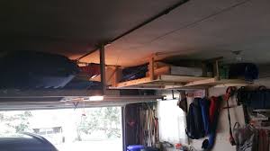 How about creating a suspended, sliding storage system where you could keep all your tools and other goodies? Garage Storage Ideas That Will Help You Keep The Clutter At Bay