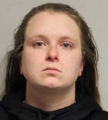 Woman pleads guilty to firearm charge