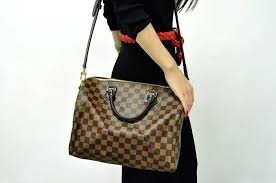 Louis Vuitton Black And Brown Checkered Purse Louis Vuitton Speedy Bandouliere 30 Damier Ebene Louis Vuitton Handbags Louis Vuitton Speedy Bandouliere Louis Vuitton Bag