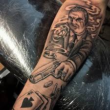 The small gangster tattoo is crafted at the hands where in the gangster is sitting in a car and the face is hidden, aiming to shoot someone in the front. 25 Risky And Ascetic Gangster Tattoo Designs Gangsterskie Tatuirovki Tatu Ruki Eskiz Tatu