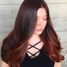 Burgundy ombre two colors in one, this dark mane was transformed into red brown hair with the magic touch of a talented. 10 Peekaboo Highlight Ideas You Re Going To Obsess Over Hair Com By L Oreal