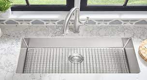 Start by adding plumber's putty to the underside of the basket strainer and fit. Best Kitchen Sink Protector Mats In 2021