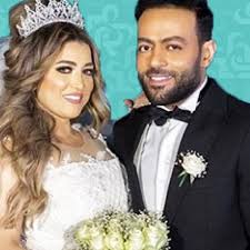 تامر عاشور، مواليد 2 يناير عام 1984، مطرب مصري, قام بإصدار أكثر من 15 أغنية من 2004 حتى 2008 الميلاد: Ø³Ø®Ø±ÙˆØ§ Ù…Ù† Ø²ÙˆØ¬Ø© ØªØ§Ù…Ø± Ø¹Ø§Ø´ÙˆØ± Ø§Ù„Ø­Ø§Ù…Ù„ ØµÙˆØ±Ø© Ù…Ø¬Ù„Ø© Ø§Ù„Ø¬Ø±Ø³