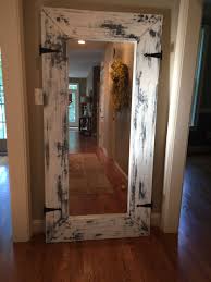 This Used To Be An Ikea Mongstad Mirror Painted Sanded And Added Some Hardware Rustic Old Barn Inspired Mirror For Ha Old Wood Doors Rustic Mirrors Decor