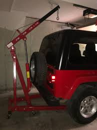 A hoist can make the job much easier. Diy Hardtop Hoist Jeep Wrangler Tj Forum