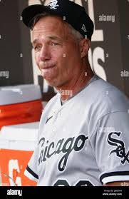Chicago White Sox third base coach Joey Cora (28) greets Jermaine Dye (23)  as he rounds third after hitting a two-run homer scoring Tadahito Iguchi'  during the first inning against the Toronto