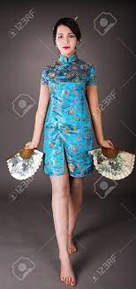 Young Beauty Japanese Woman In Blue Dress Stock Photo, Picture and Royalty  Free Image. Image 4278638.