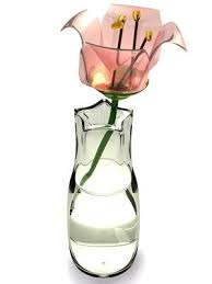 How To Make Your Own Fake Water For Artificial Flowers Fake Flower Arrangements Flower Arrangements Diy Faux Flower Arrangements