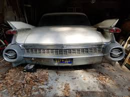 Image result for Silver 1959 Cadillac