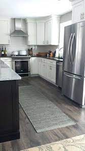 These ideas—like diamond patterns, floral stencils, and deep colors—are guaranteed to breathe in this small banquette kitchen, painted stripes on the floor make the space appear wider and larger. Some Examples Of Modern And Traditional Kitchen Floor Ideas Laminate Flooring In Kitchen Home Decor Kitchen Renovation