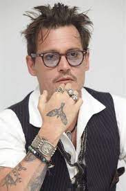 Johnny depp family tattoo three hearts can be seen on depp's upper left arm and speaks to his family, vanessa and his two children. A Complete List Of Johnny Depp Tattoos Jack Sparrow Tattoos