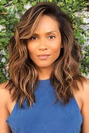 14 Must-Try Hairstyles for Long Curly Hair