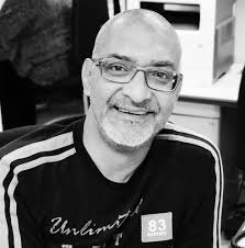 𝗗𝗝 𝗣𝗥𝗢𝗙𝗜𝗟𝗘 -𝗦𝗮𝗮𝗻 𝗠𝗼𝗵𝗮𝗺𝗲𝗱** Saan Mohamed emerged as one  of the most influential DJs of the 1980s, captivating audiences with his  electrifying sets at the legendary Q Supper Club. Known for his