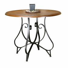 To raise the height of a table temporarily, buy a set of bed risers, which are wood or plastic supports that go on the bottom of your table legs. Sunset Trading Cr Nd518 49 Camel Crossing Pub Table 42 Round Light Brown And Black Counter Height Furniture Home Kitchen Botani Com Au