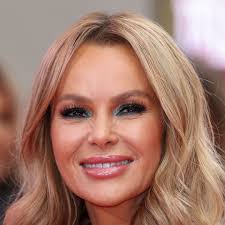 Amanda Holden floors fans in leg-lengthening jeans and sequin blouse