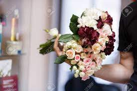 Check spelling or type a new query. Persons Holds Bouquets Made Of Pink White And Wine Colored Flowers Stock Photo Picture And Royalty Free Image Image 71065633