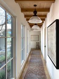 The illumination of this display light gives an aesthetic appeal to the traditional painting as well as the wall. Sneak Peek Designer Amber Lewis S Belgian Farmhouse Marvin