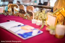 We often get questions about the kinds of albums we provide. Heart Melting Indian Wedding Guest Book Table Photo 142340