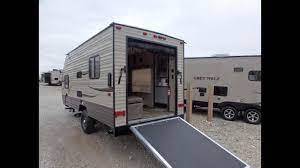 Step inside and find a queen size bed across the front with storage cabinets above two side, over the head of the bed, and along one side. 2017 Forest River Wolf Pup 17rp Walk Thru 8223 Youtube