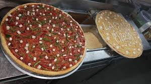 La Pinoz The Giant Pizza Slice On Instagram Presenting To You Our Special Giant Pizza Slice With Extra Drooling Cheese Pizza Slice Giant Pizza Pizzza