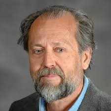 PERI faculty members (from left) Steven Sprick Schuster, Daniel Smith, and  Ennio Piano celebrate PERI Fellow Protik Nandy's suc