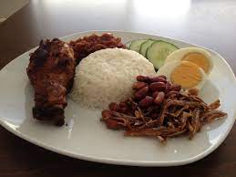 Served with sambal, fried chicken, eggs, cucumber and peanuts. Sambal Belacan Jana S Culinary Escapades